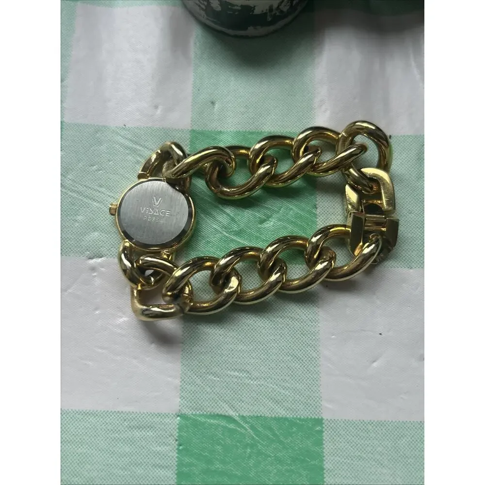 Visage Gold Tone Bracelet Women’s Quartz Watch
